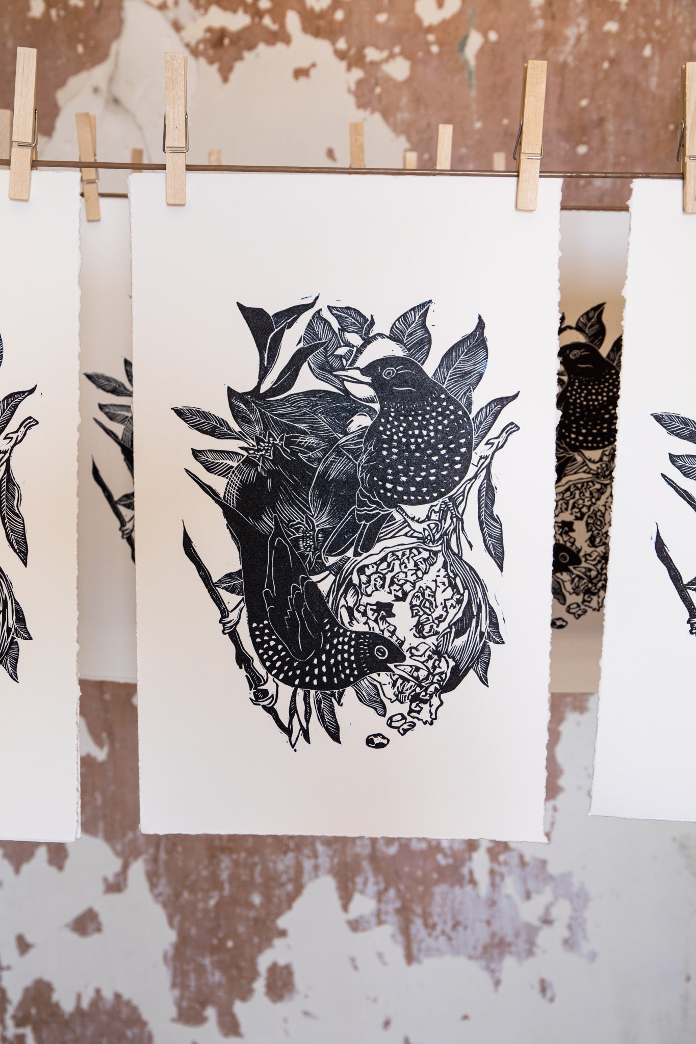 "Starling and pomegranate", lino print