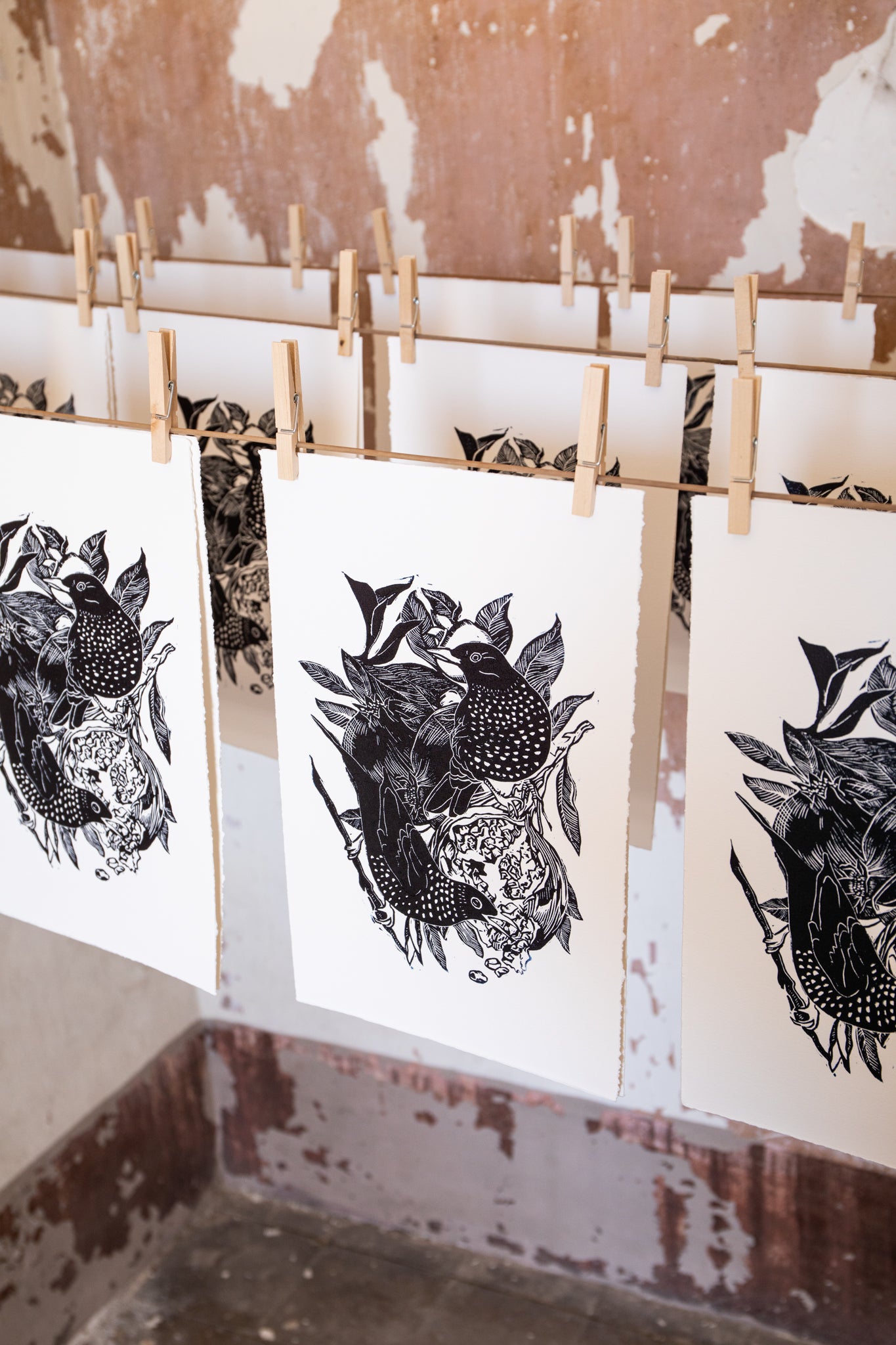"Starling and pomegranate", lino print