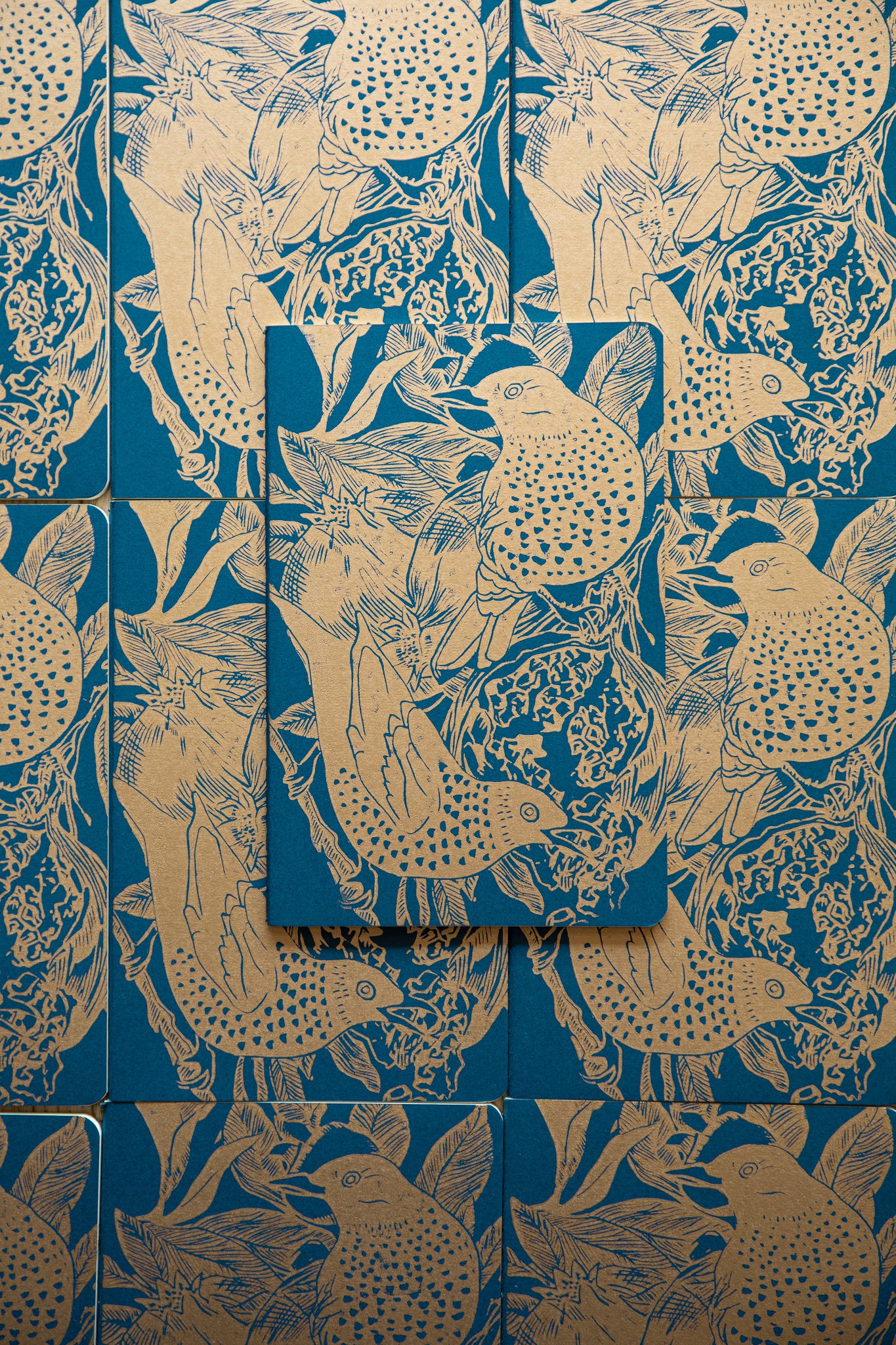 Dark blue and gold notebook, Starling and pomegranate