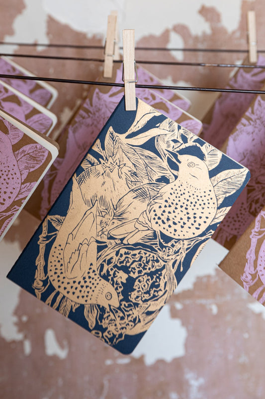 Dark blue and gold notebook, Starling and pomegranate